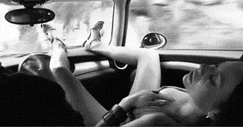 Gif of a girl masturbating in the passenger seat of the car
