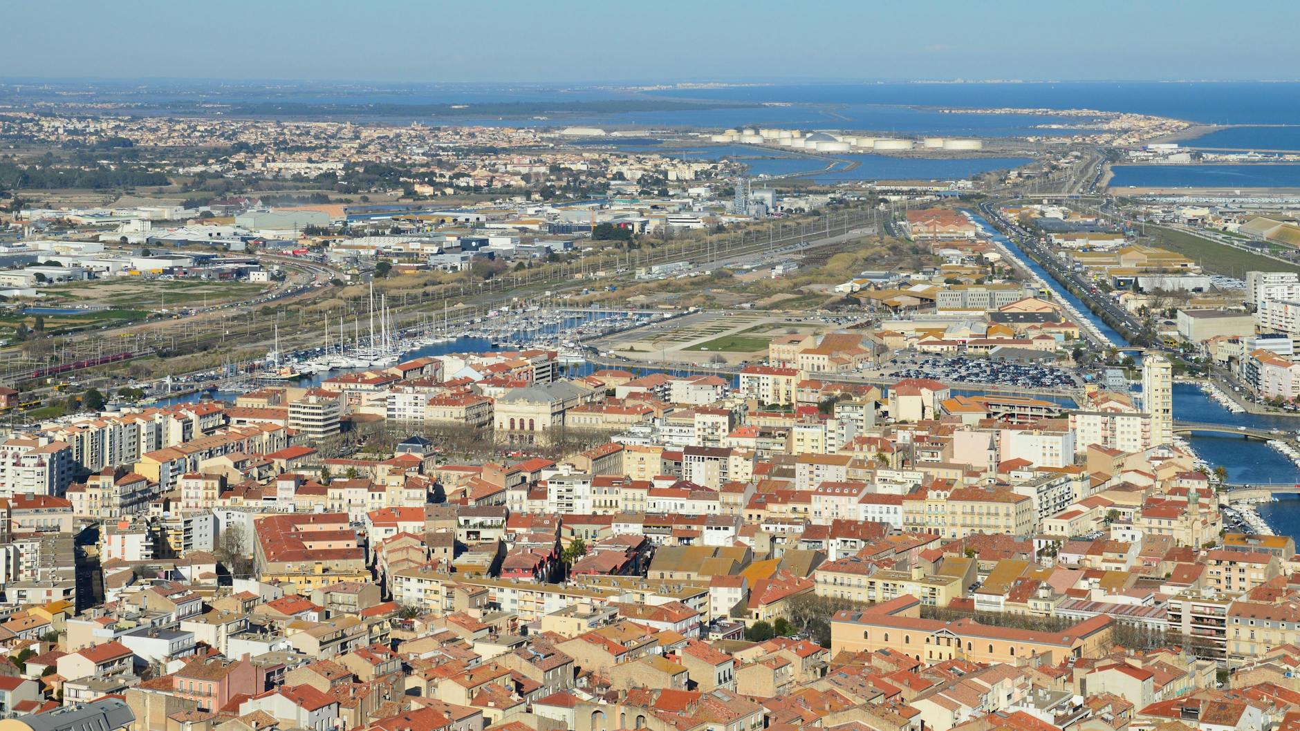 Aerial view of Sète, France with its vibrant rooftops and harbor.